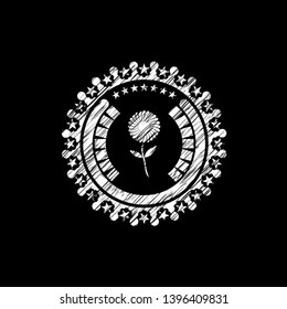 flower icon inside chalkboard emblem on black board