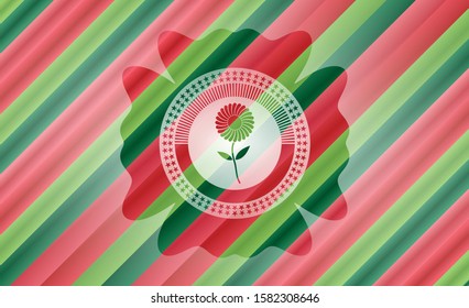 flower icon inside christmas colors badge.
