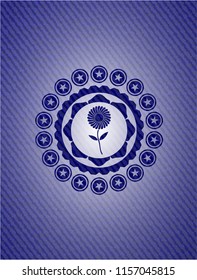 flower icon inside denim background