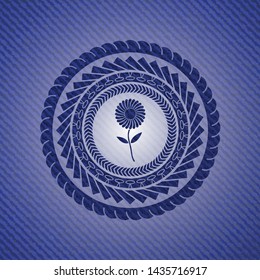 flower icon inside denim background