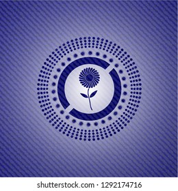 flower icon inside emblem with denim high quality background