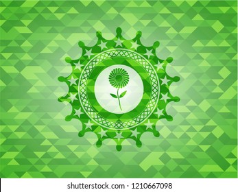 flower icon inside green emblem. Mosaic background