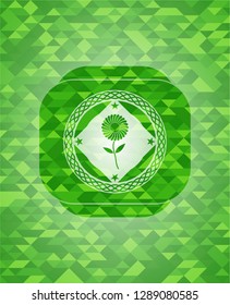 flower icon inside green emblem. Mosaic background