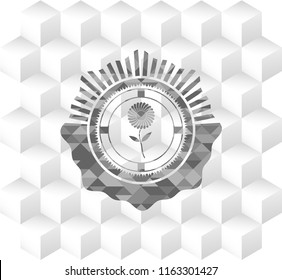 flower icon inside grey badge with geometric cube white background