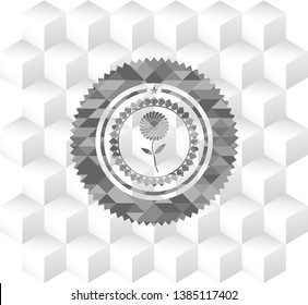 flower icon inside grey badge with geometric cube white background