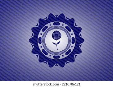 icono de flor dentro de jean o denim emblem o fondo de placa. 