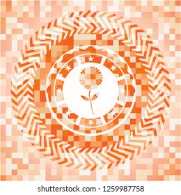 flower icon inside orange mosaic emblem