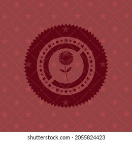 flower icon inside red emblem. 