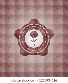 flower icon inside red seamless badge with geometric background.