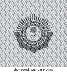 flower icon inside shiny silver emblem. Scales pattern. Vector Illustration. Detailed.