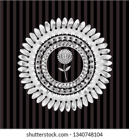 flower icon inside silver badge or emblem