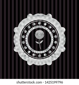 flower icon inside silver shiny emblem
