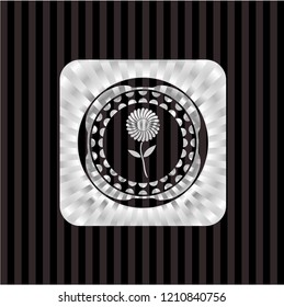 flower icon inside silvery badge