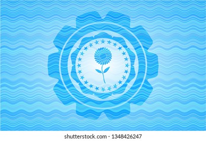 flower icon inside sky blue water wave style badge.
