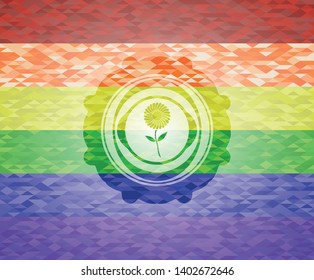 flower icon on mosaic background with the colors of the LGBT flag