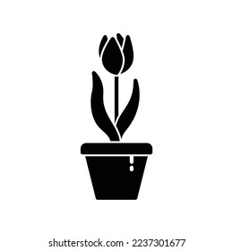 Flower icon in a vase with blooming lilies in black solid style