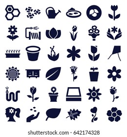 Flower icons set. set of 36 flower filled icons such as leaf, sunflower, rose, beehouse, hand with seeds, honey, lotus, watering can, water hose, pot for plants, plant in pot