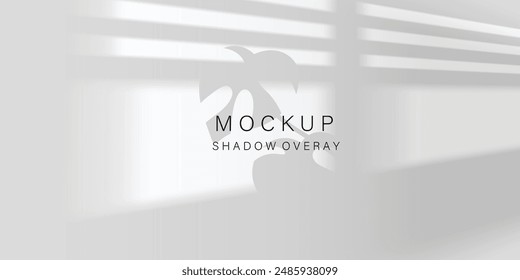 Flower and leaf Overlay effect. Gray shadow of  leaves on a white wall.