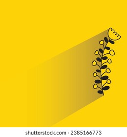 flower and leaves with shadow on yellow background