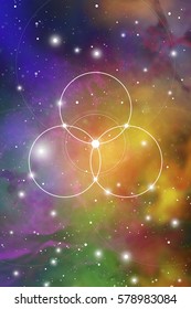 Flower of life - the interlocking circles ancient symbol in front of outer space background. Sacred geometry - mathematics, nature, and spirituality, the formula of nature.