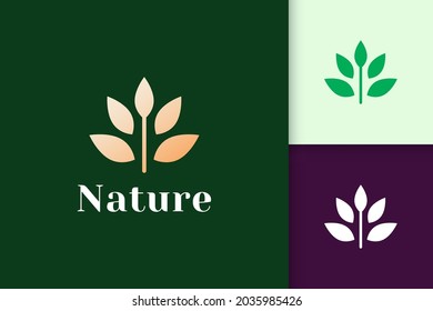 Flower logo in feminine and luxury style for health and beauty