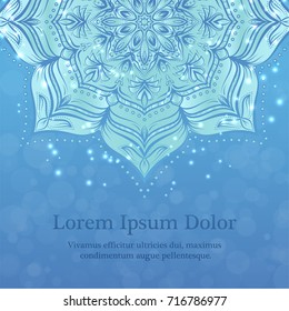 Flower mandala background in blue color with place for text