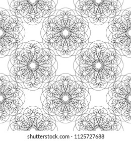 Flower mandala. Linear Graphics. Seamless pattern. Geometric symmetrical drawing. White background. Small items