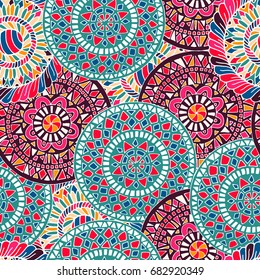 Flower mandala seamless pattern in hand drawn style for prints, fabric and ceramic. Vector illustration. 