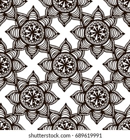 Flower mandala seamless pattern in hand drawn style for prints, fabric and ceramic. Vector illustration. 