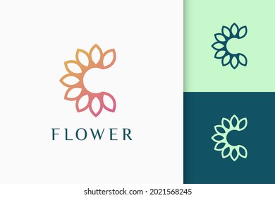 Flower or nature logo in initials or letter c shape for spa and beauty