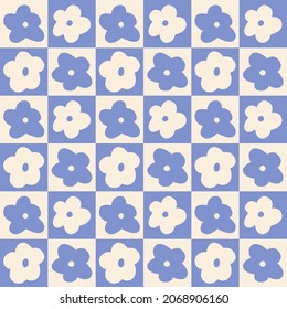Flower pattern. Floral checked plaids in blue and cream colors. Seamless pastel backgrounds with small flowers for tablecloth, dress, or other  textile design.