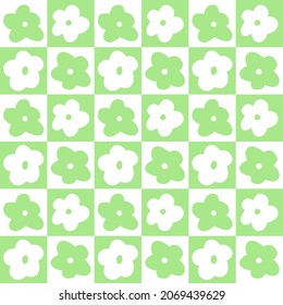 Flower pattern. Floral checked plaids in blue and cream colors. Seamless pastel backgrounds with small flowers for tablecloth, dress, or other  textile design.