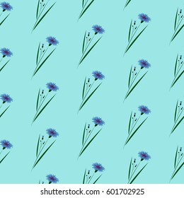 Flower pattern in flowers of cornflowers on a turquoise background. Calico Millers.Floral seamless background for textile, surface, fabric, wallpaper, print, gift wrapping and scrapbooking, decoupage