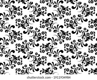 Flower pattern. Seamless white and black ornament. Graphic vector background. Ornament for fabric, wallpaper, packaging