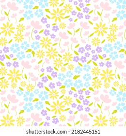 Flower pattern of small colorful flowers and leaves on a white background