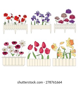 Flower pots with cultivated flowers. Decorative fence. Plants growing on window sills and balcony