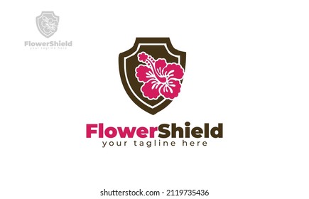 Diseño del logotipo del escudo de flores. vector