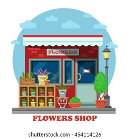 Flower shop or store side view on building exterior with leatherleaf-fern in flowerpot and may-lily in wooden box, cactus. For trading and shopping, business and gift, nature theme