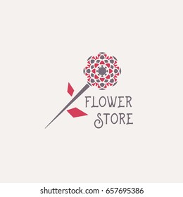 Flower store symbol or emblem. Vector geometric logo template for flower shop