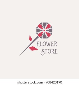 Flower store symbol or emblem. Vector geometric logo template for flower shop