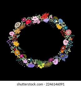 Flower wreath on black background poppies chamomile cornflowers roses berries