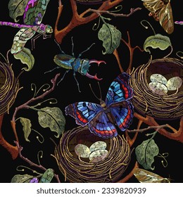 Flowering apple tree, horned stag beetle, butterflies and bird nest with eggs. Seamless pattern. Happy easter art. Embroidery design. Fashion spring garden style. Template for design of clothes