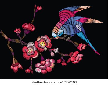 Flowering branch with a bird on a black background. Vector Illustration for embroidery, patches and stickers.
