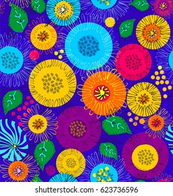 Flowers of Asters and Chrysanthemums drawn zigzag lines in green, purple, blue, orange and yellow colors a seamless pattern on a blue background.