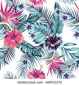 Flowers of the bird of paradise, hibiscus, plumeria and palm leaves in the jungle in abstract color. Seamless vector beach wallpaper pattern on white background