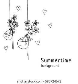 Flowers in bottlea summer background