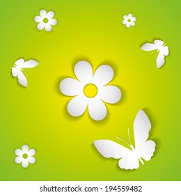 flowers and butterflies cut from paper on yellow and green background