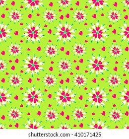 flowers and hearts on a green background seamless pattern