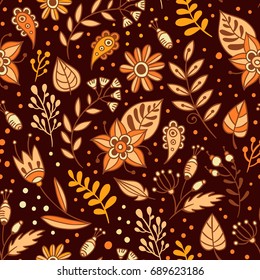 Flowers and herbs vector seamless pattern. Floral background with orange, beige and brown leaves and plants. Hand drawn summer or autumn botanic texture in doodle style