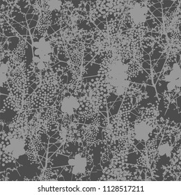 Flowers of hydrangea climbing plant in gray color seamless pattern on dark gray background